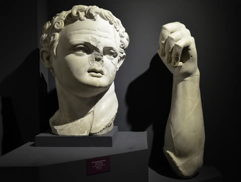 A colossal marble head and a raised forearm from an imperial cult statue, in the Ephesus Museum