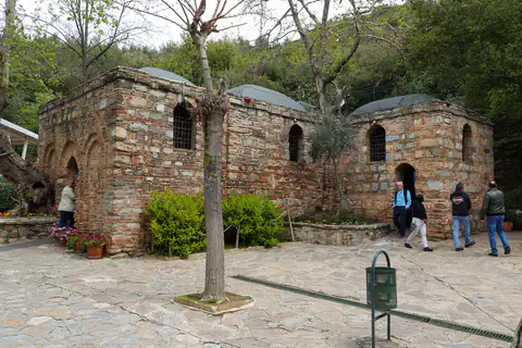 The House of the Virgin Mary at Meryemana, a small stone chapel among trees