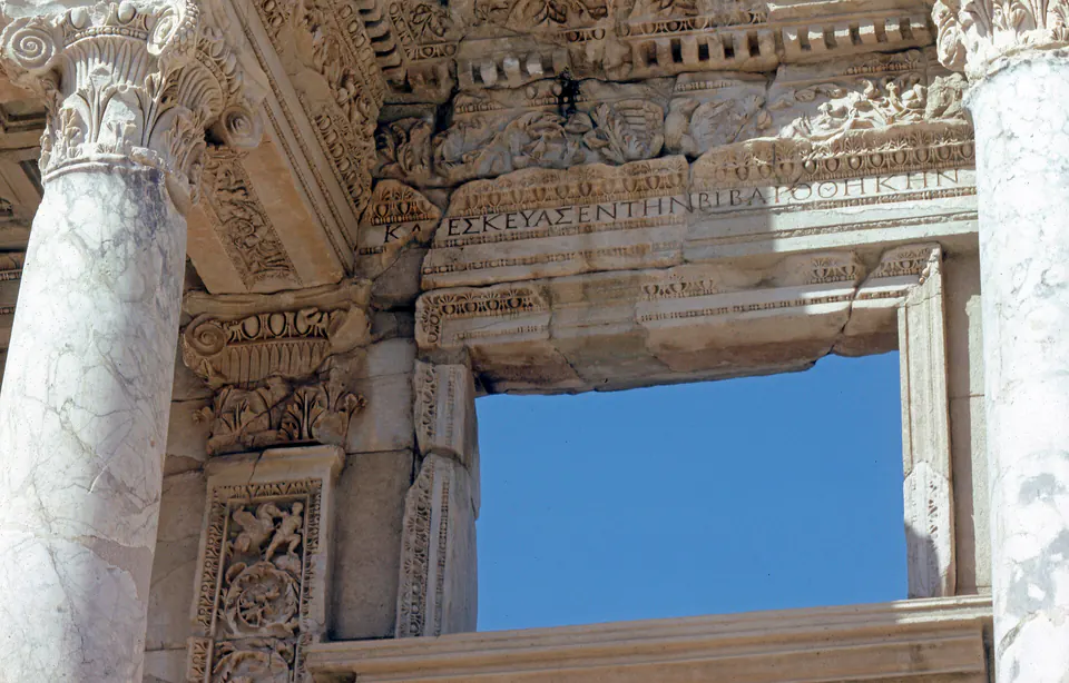 Carved frame of a window opening in the Library of Celsus façade