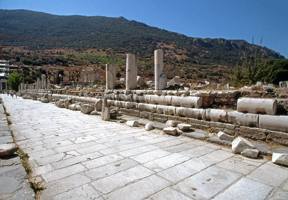 Marble Street’s broad paving beside rows of column bases and low walls