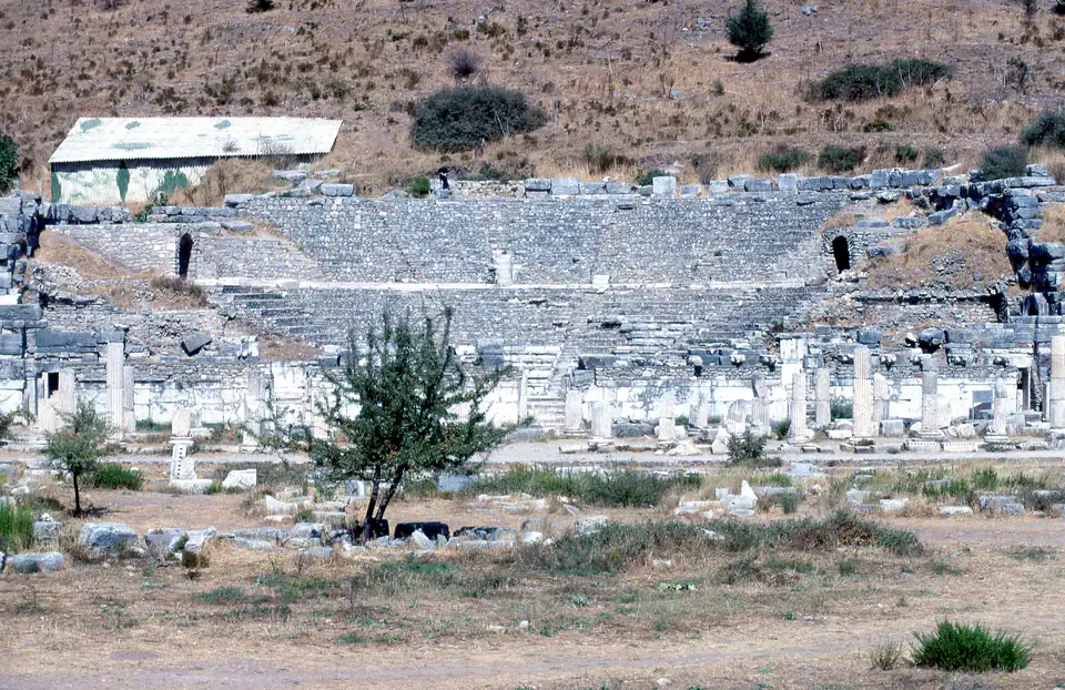 The Odeon seen across the State Agora, with a lone tree in front