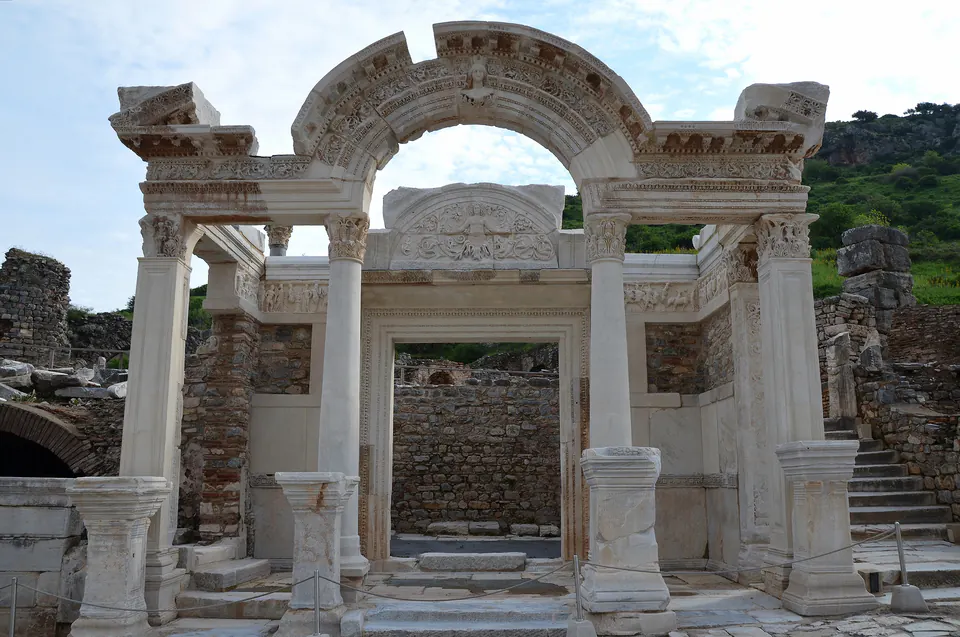 The front of the Temple of Hadrian with its arch, columns and inner doorway